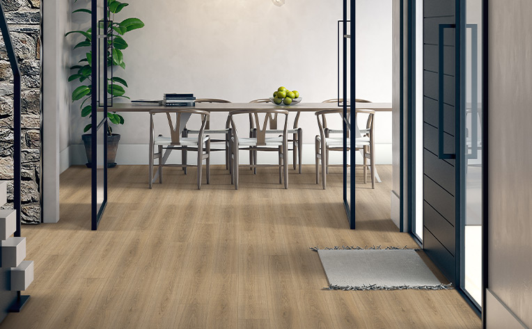 laminate flooring in entryway with table
